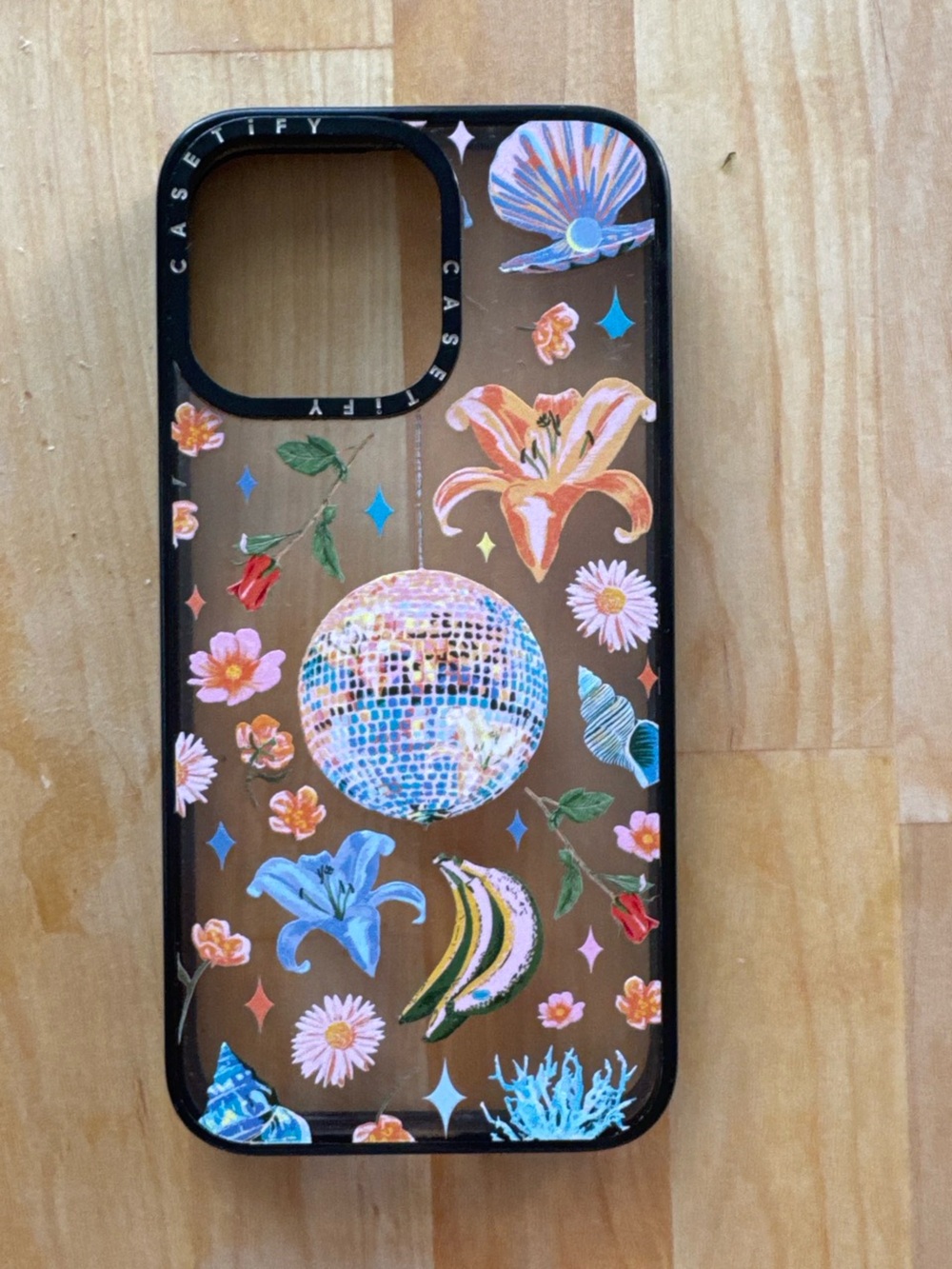 Casetify Clear Case with Multicolor Floral & Disco Ball Design